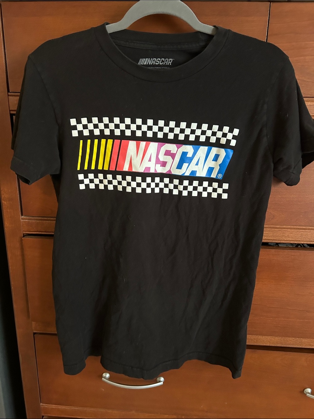 Nascar Black Tee with Red, Blue & Yellow Logo and Checkered Stripes